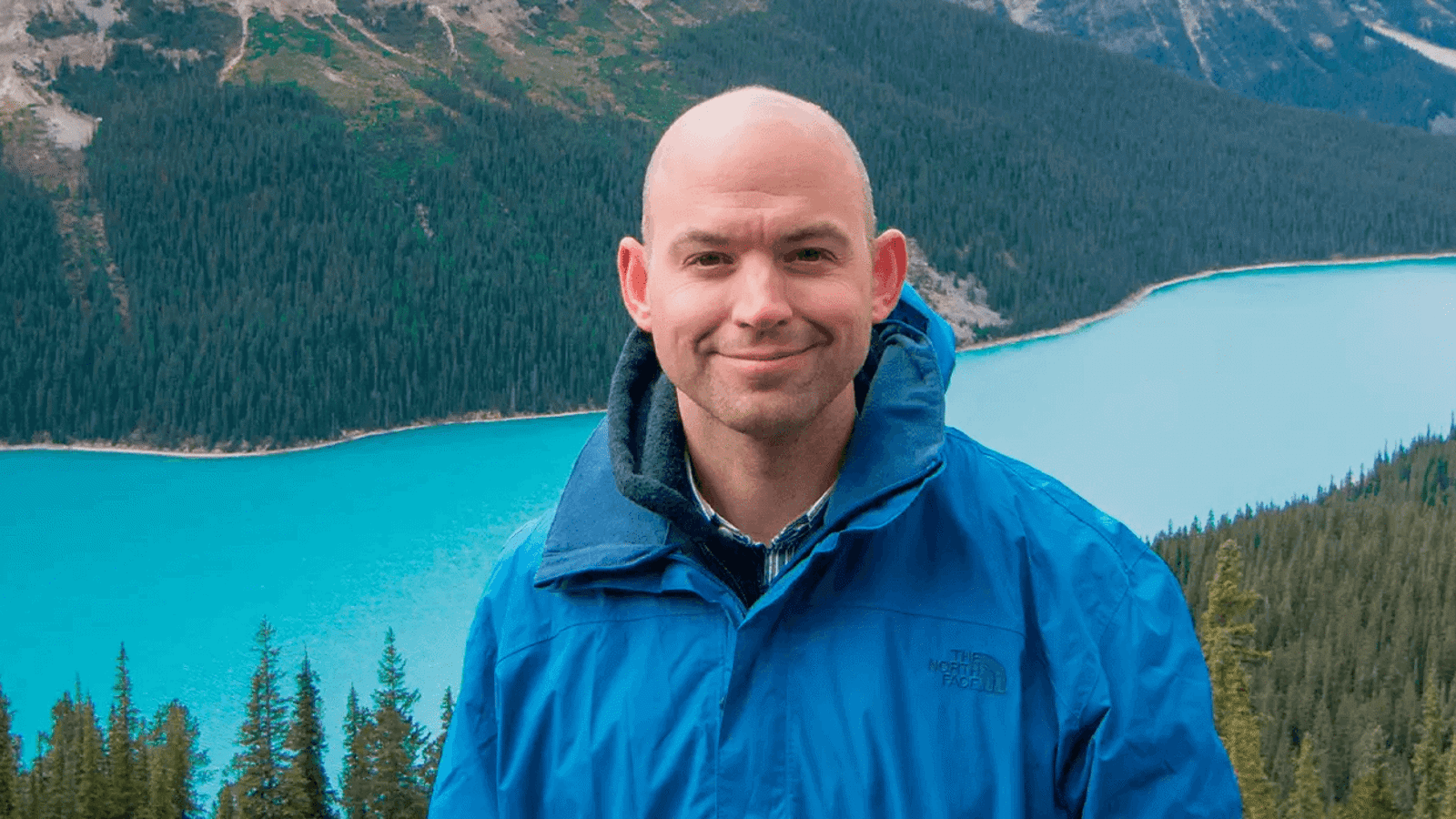 a man in a blue jacket