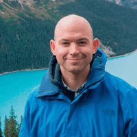 a man in a blue jacket