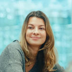 a woman smiling at camera