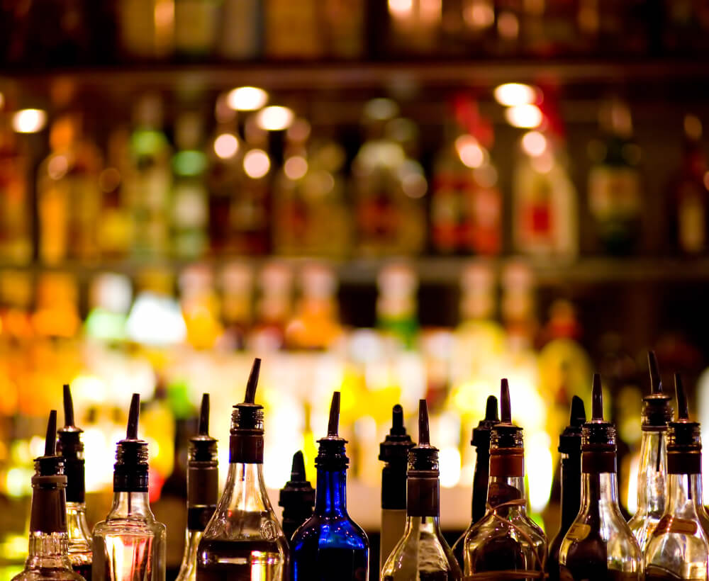 a group of bottles in a row