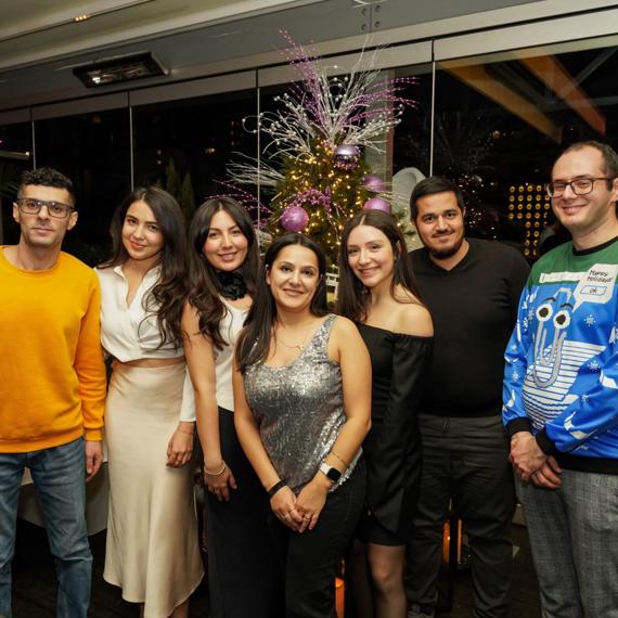 a group of people posing for a photo