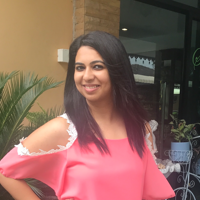 a woman in a pink shirt