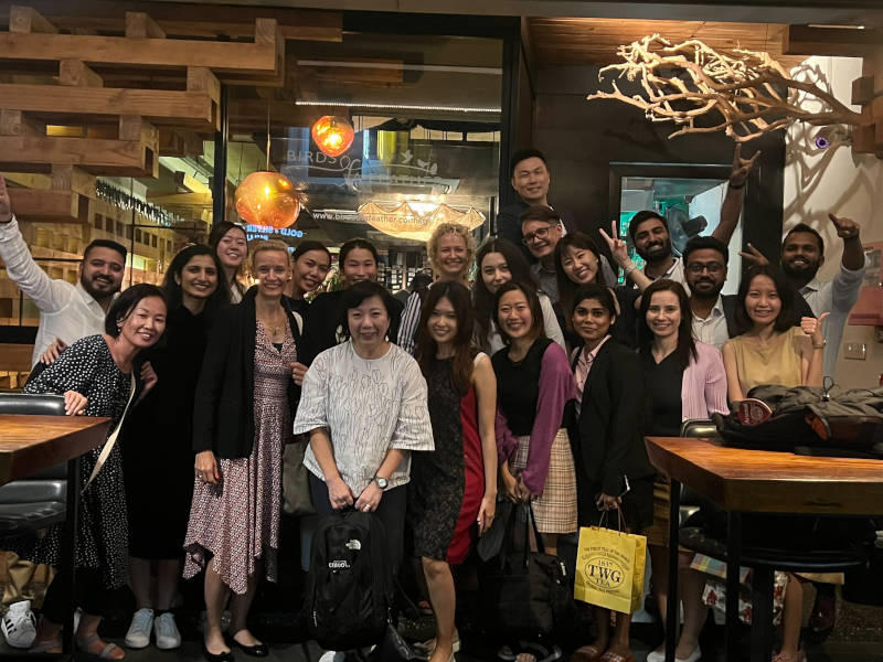 a group of people posing for a photo