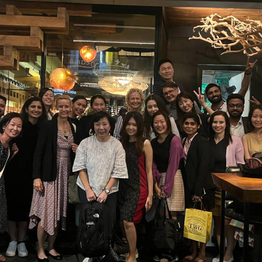 a group of people posing for a photo