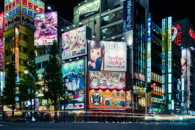 a street with signs and buildings