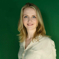 a woman with blonde hair smiling