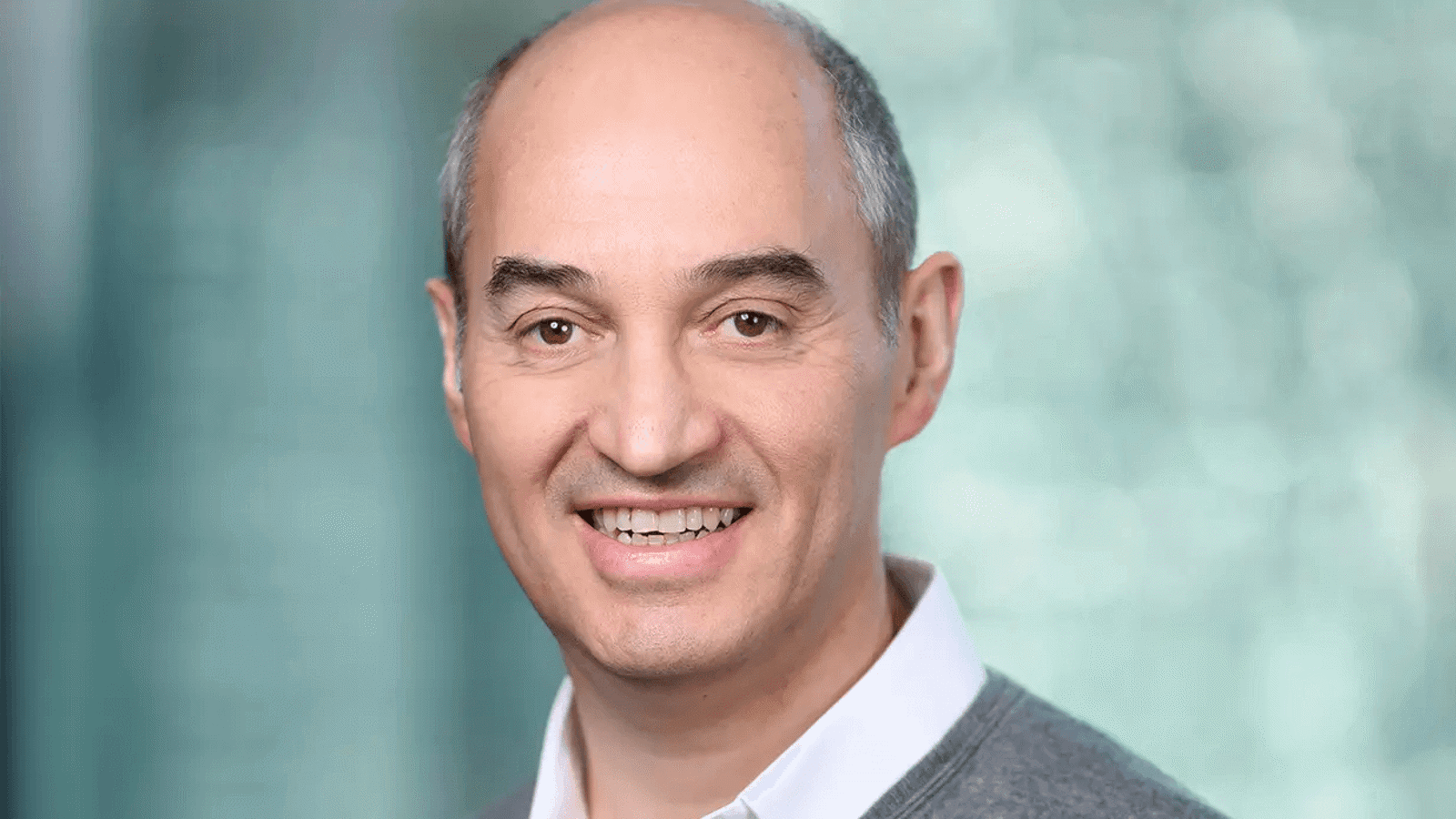 a man smiling for a picture