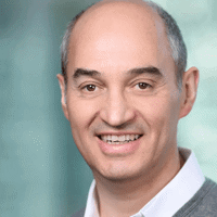 a man smiling for a picture