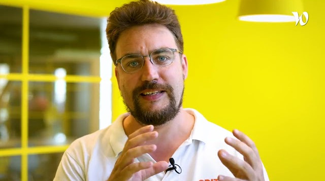 a man with glasses and a beard
