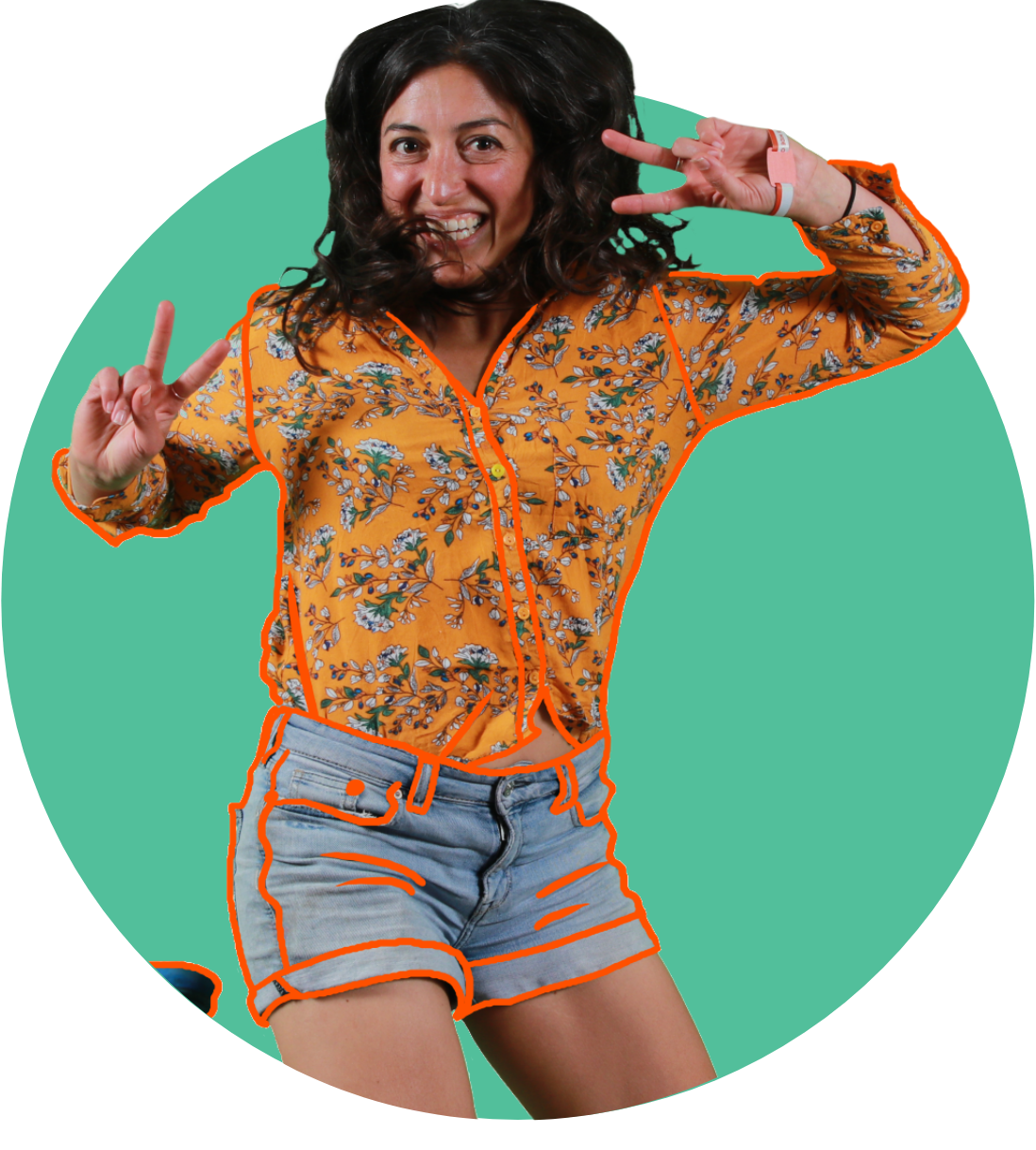 a woman smiling and making peace signs