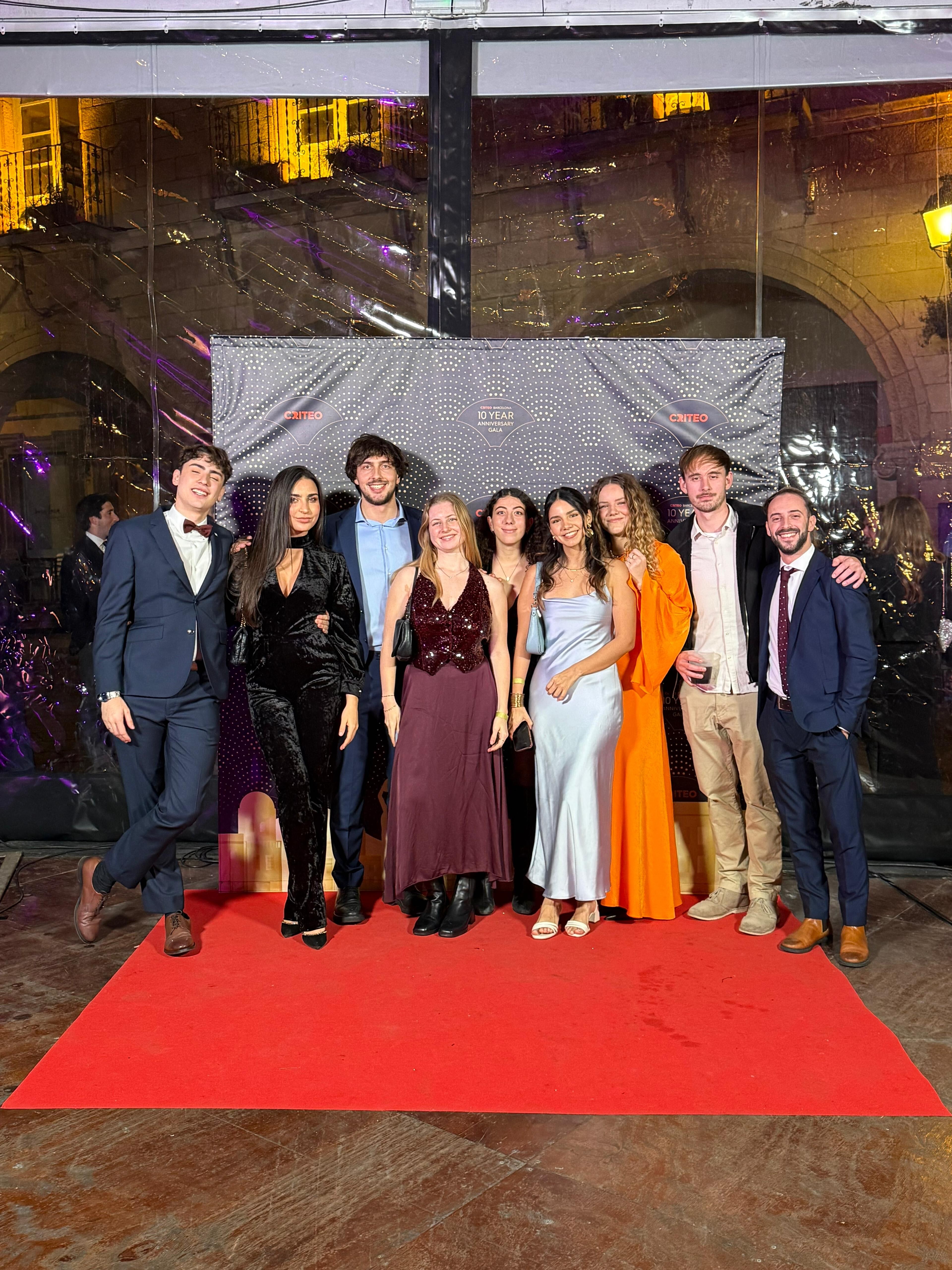 a group of people posing for a photo