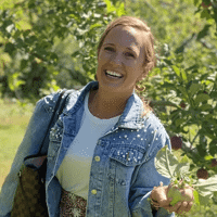 a woman smiling at the camera