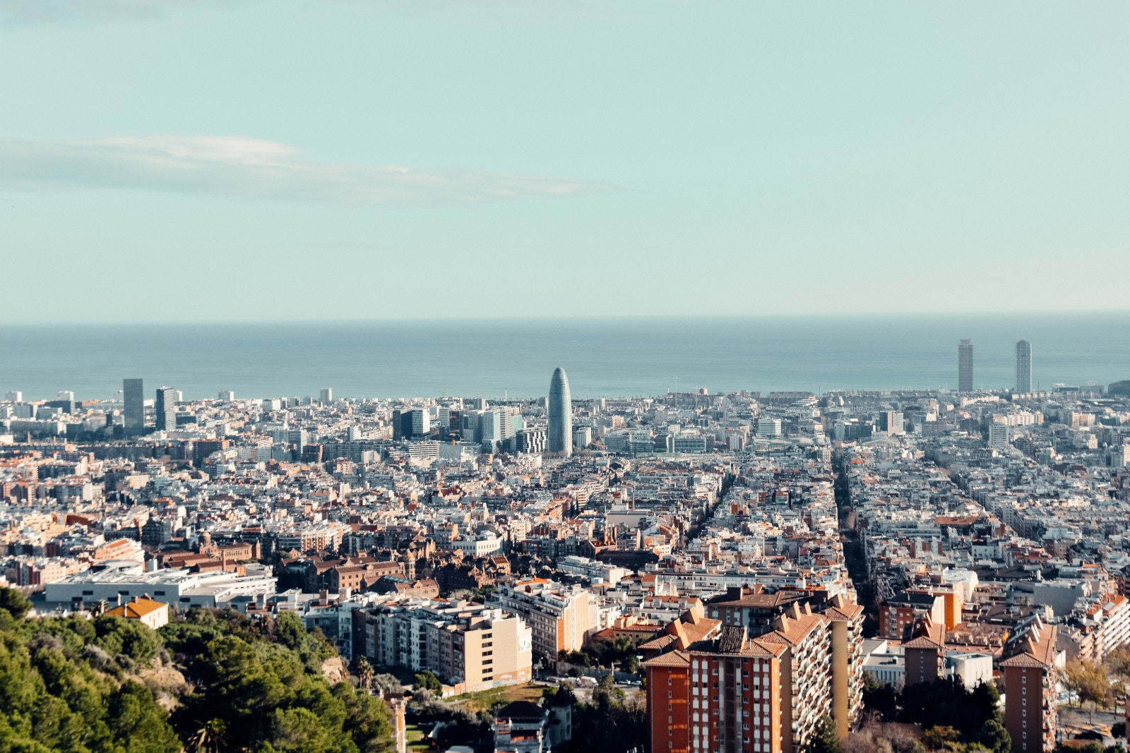 a city with many buildings and a body of water