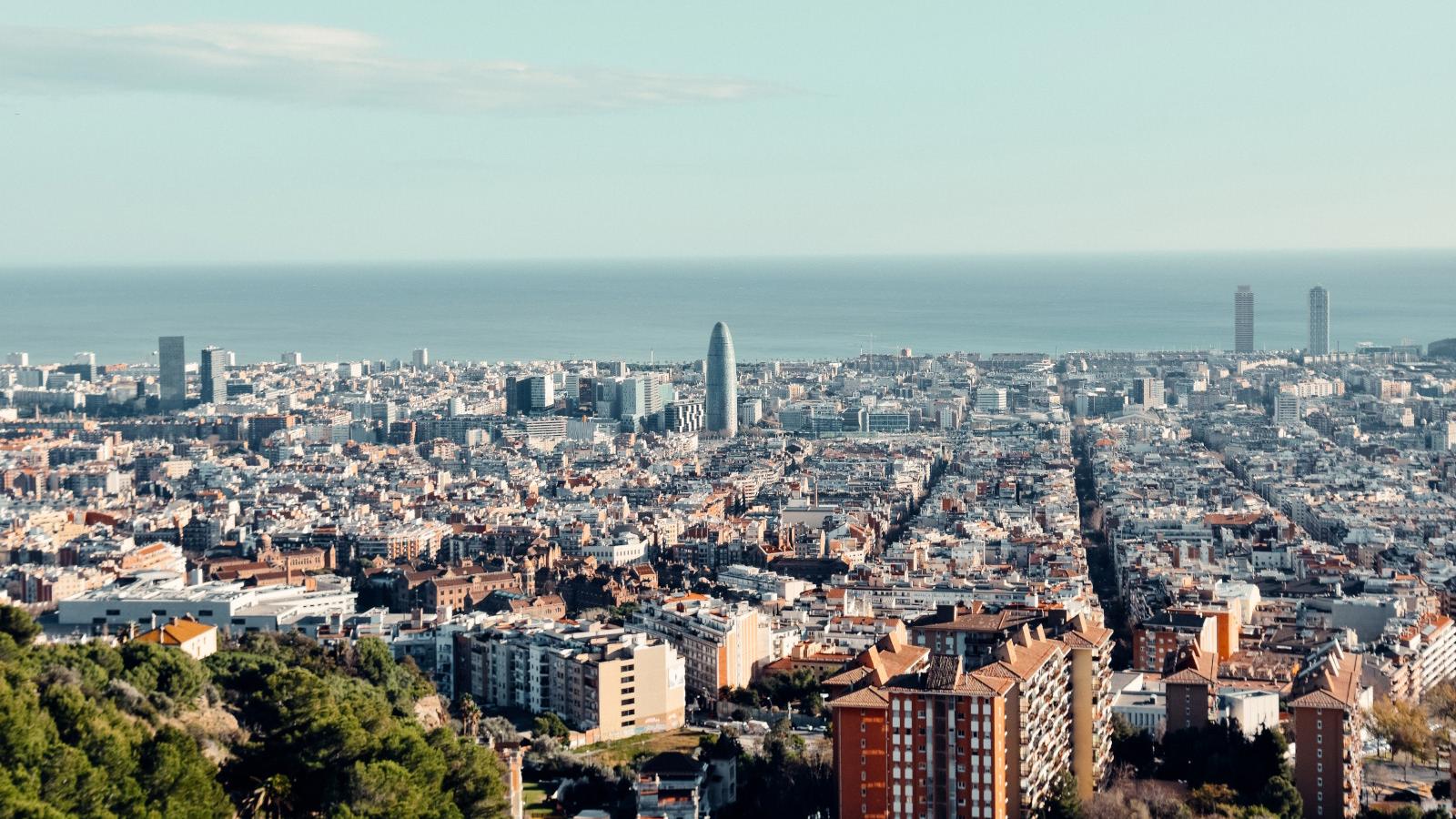 a city with many buildings and a body of water