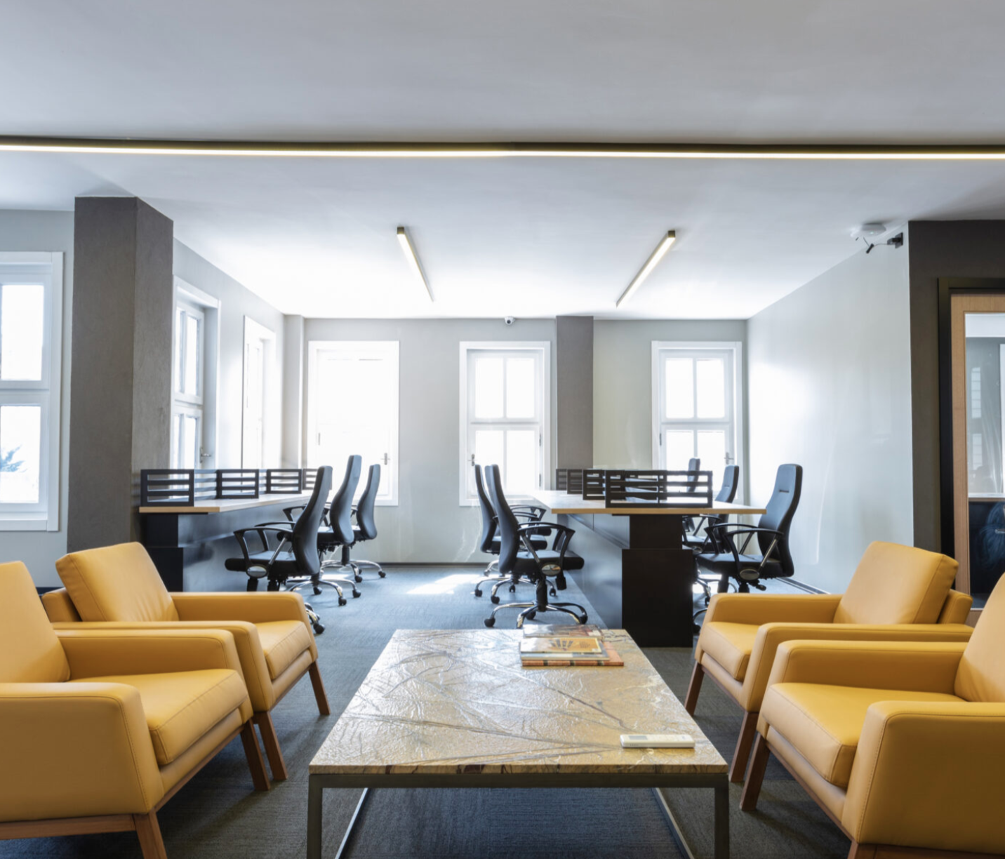 a room with chairs and tables
