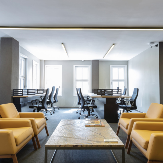 a room with chairs and tables