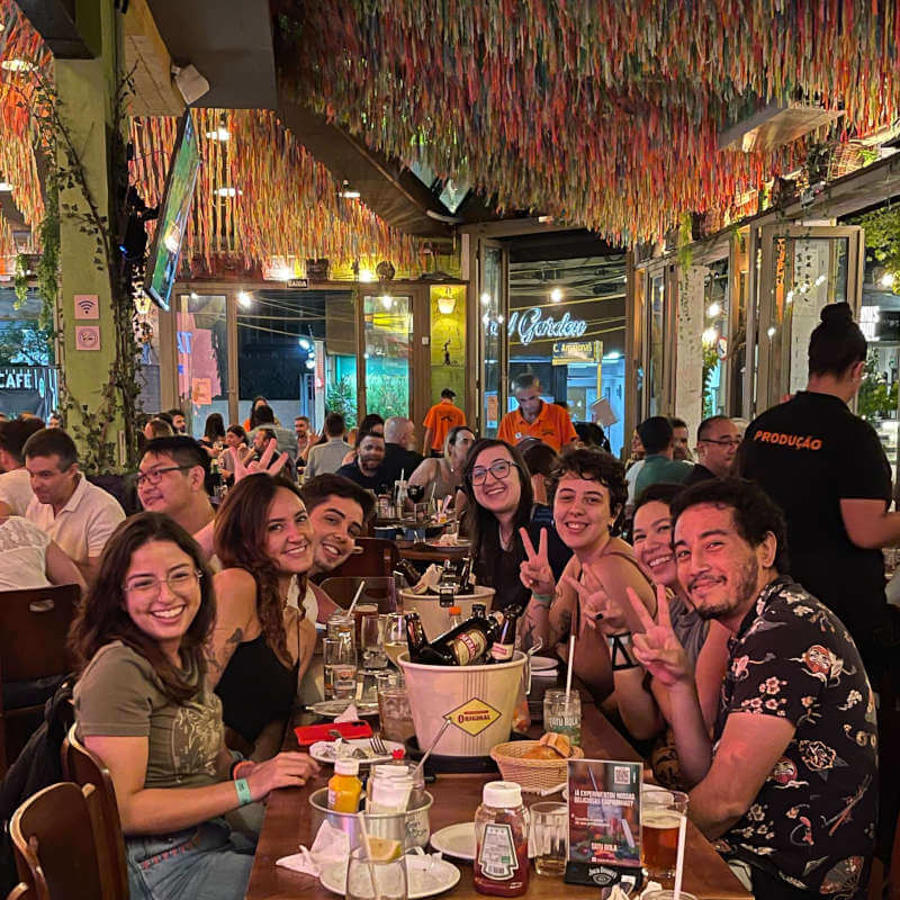 a group of people sitting at a table