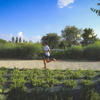 a man running in a field