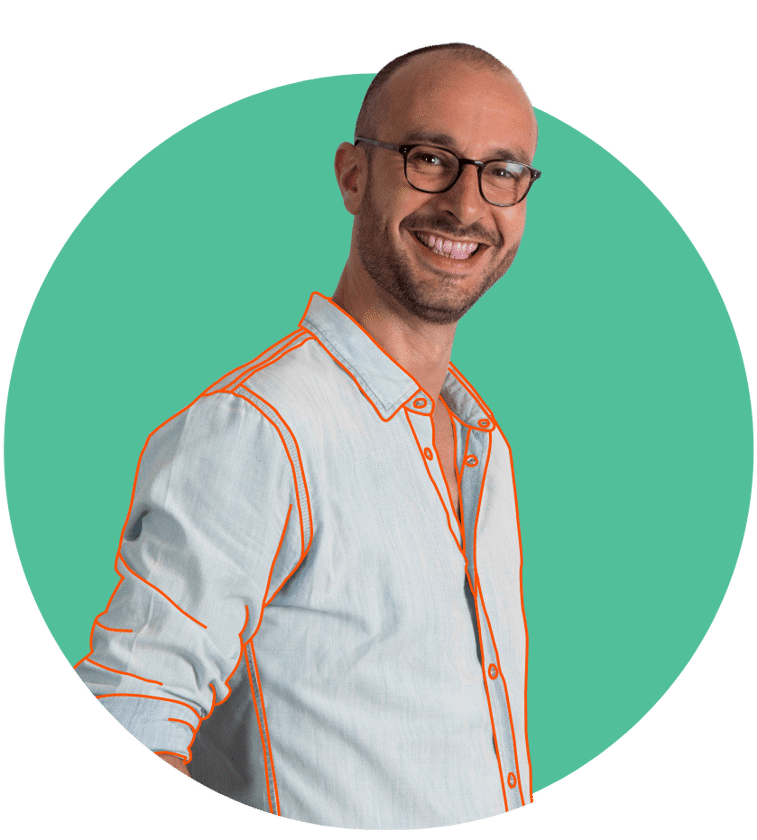 a man smiling at the camera