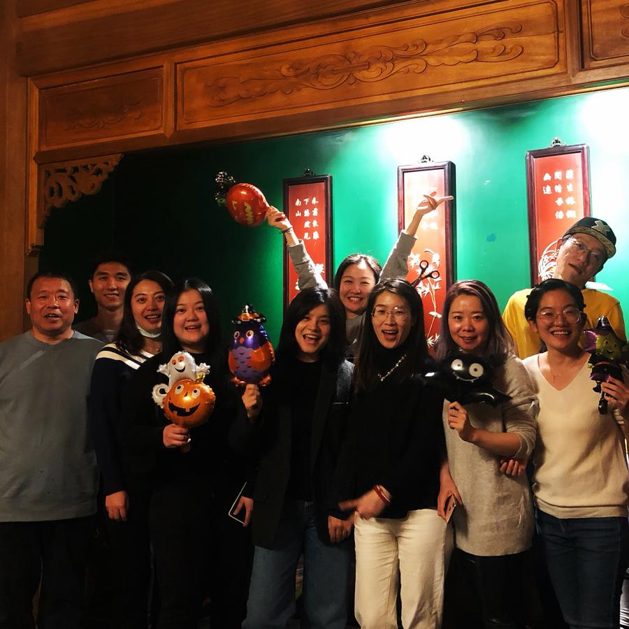 a group of people posing for a photo