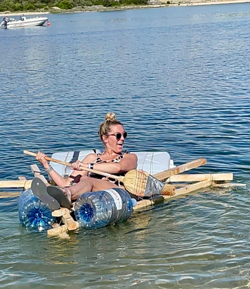 a woman in a raft on water