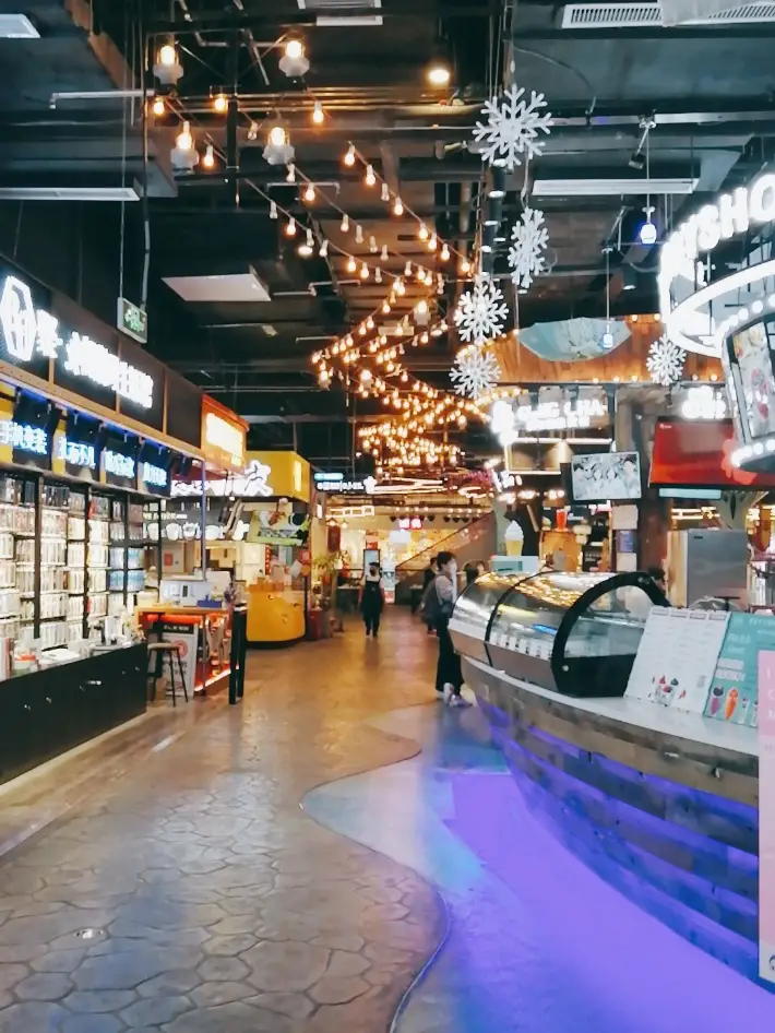 a store with lights from ceiling