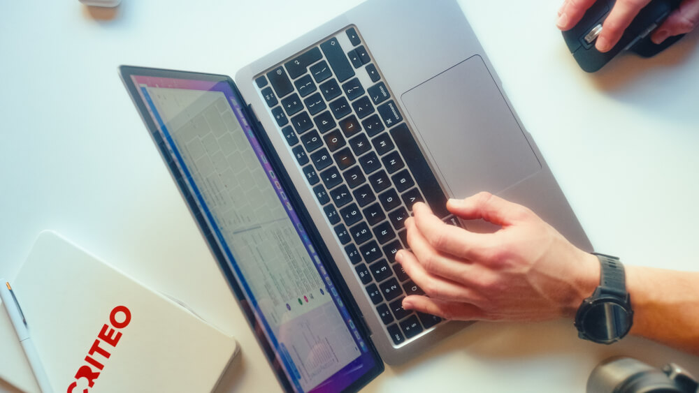 a person typing on a laptop