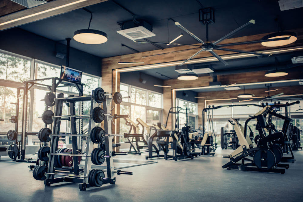 a gym with weights and exercise equipment