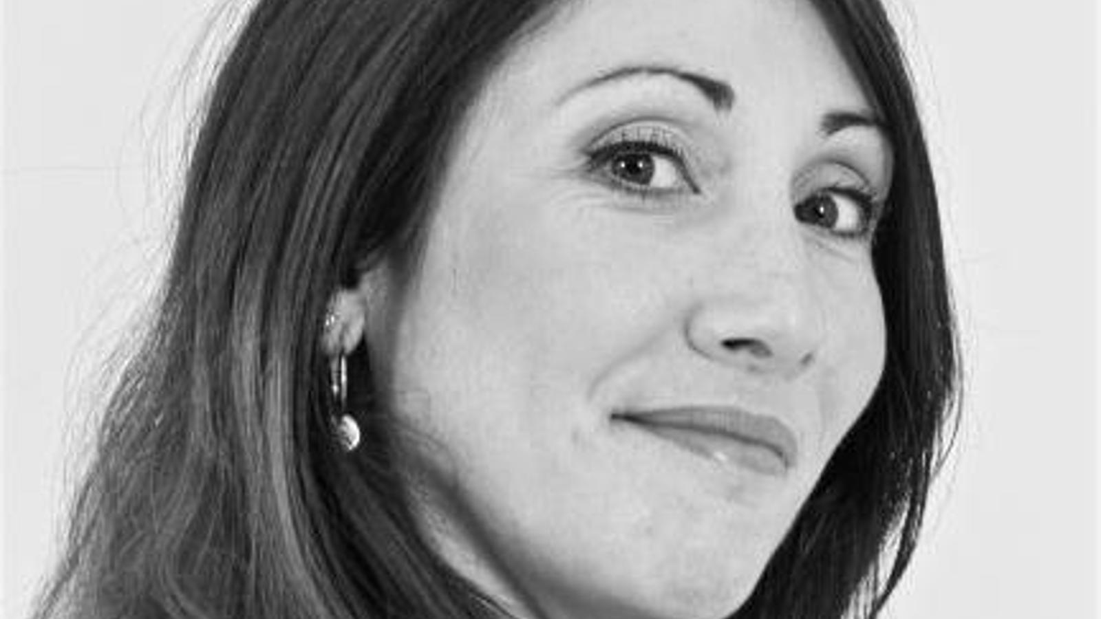 a close-up of a woman smiling