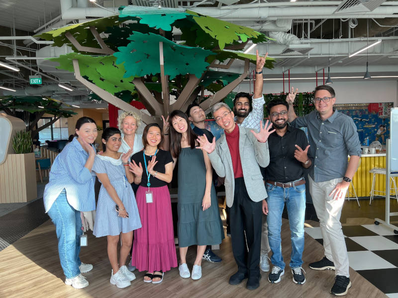 a group of people posing for a photo