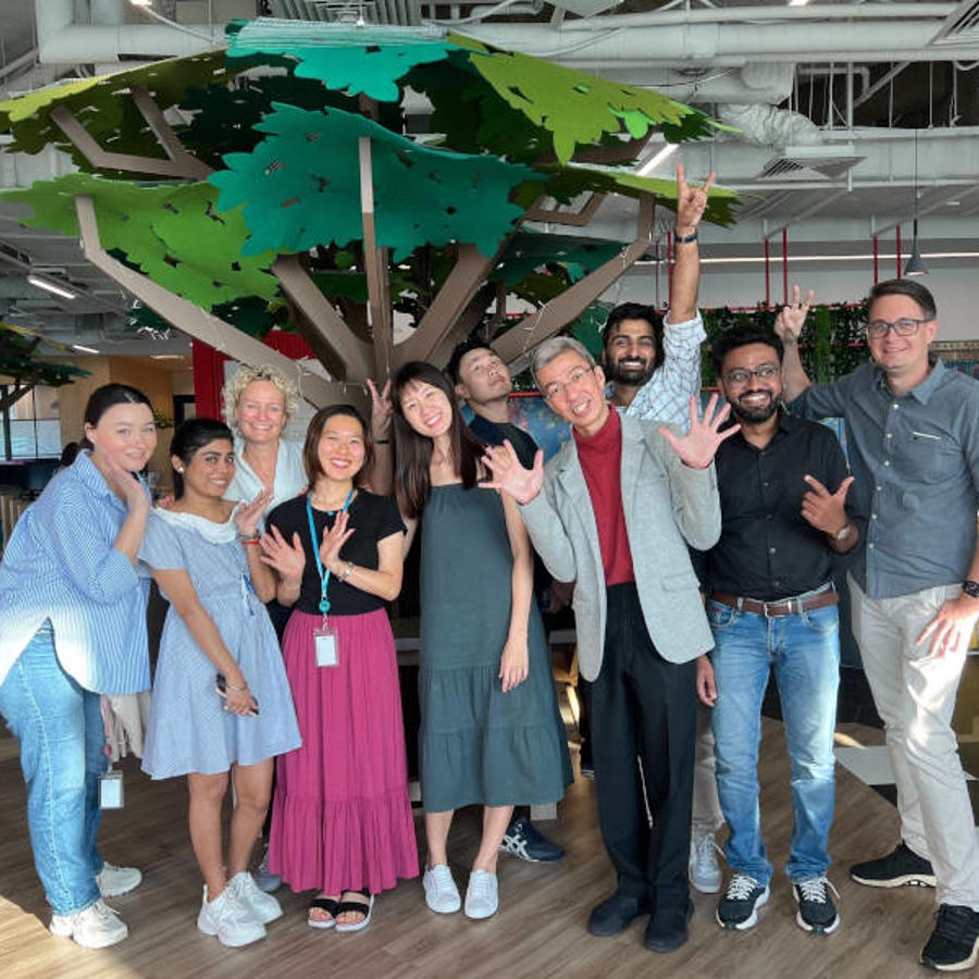 a group of people posing for a photo