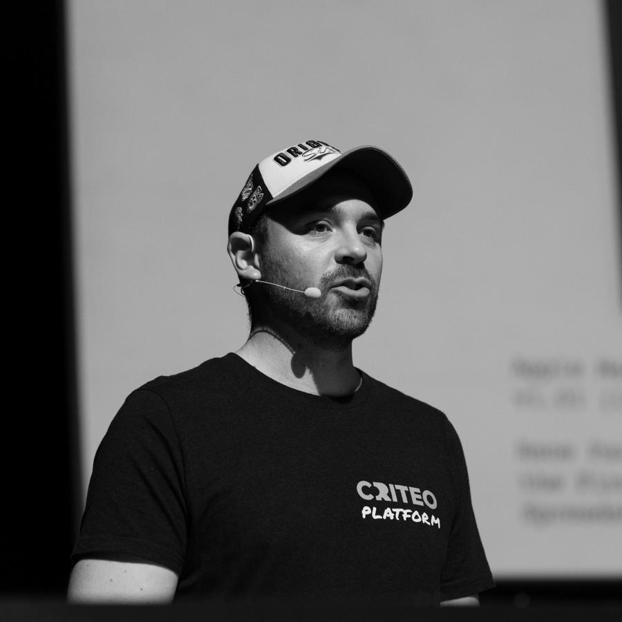 a man wearing a hat and a microphone