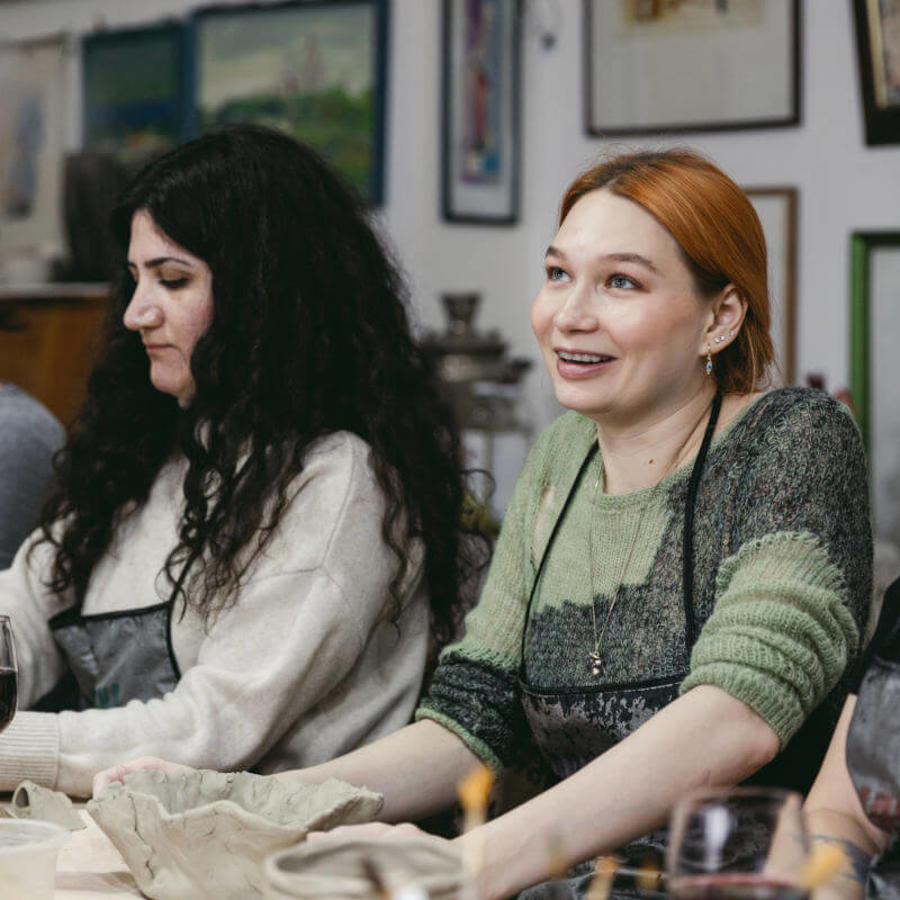a group of women sitting at a table
