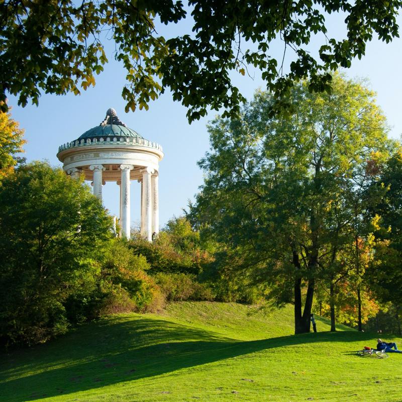 a park with a gazebo and trees