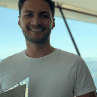 a man smiling at camera