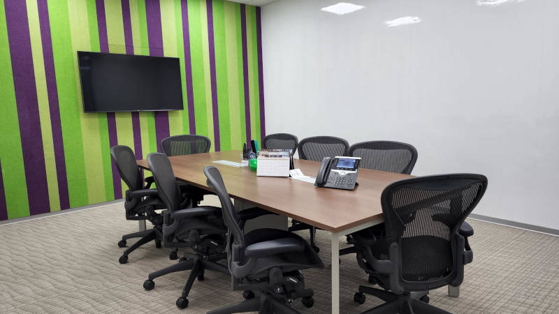 a conference room with chairs and a table