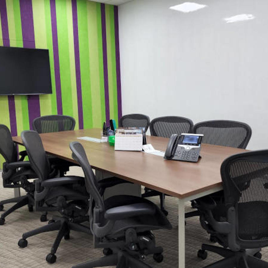a conference room with chairs and a table