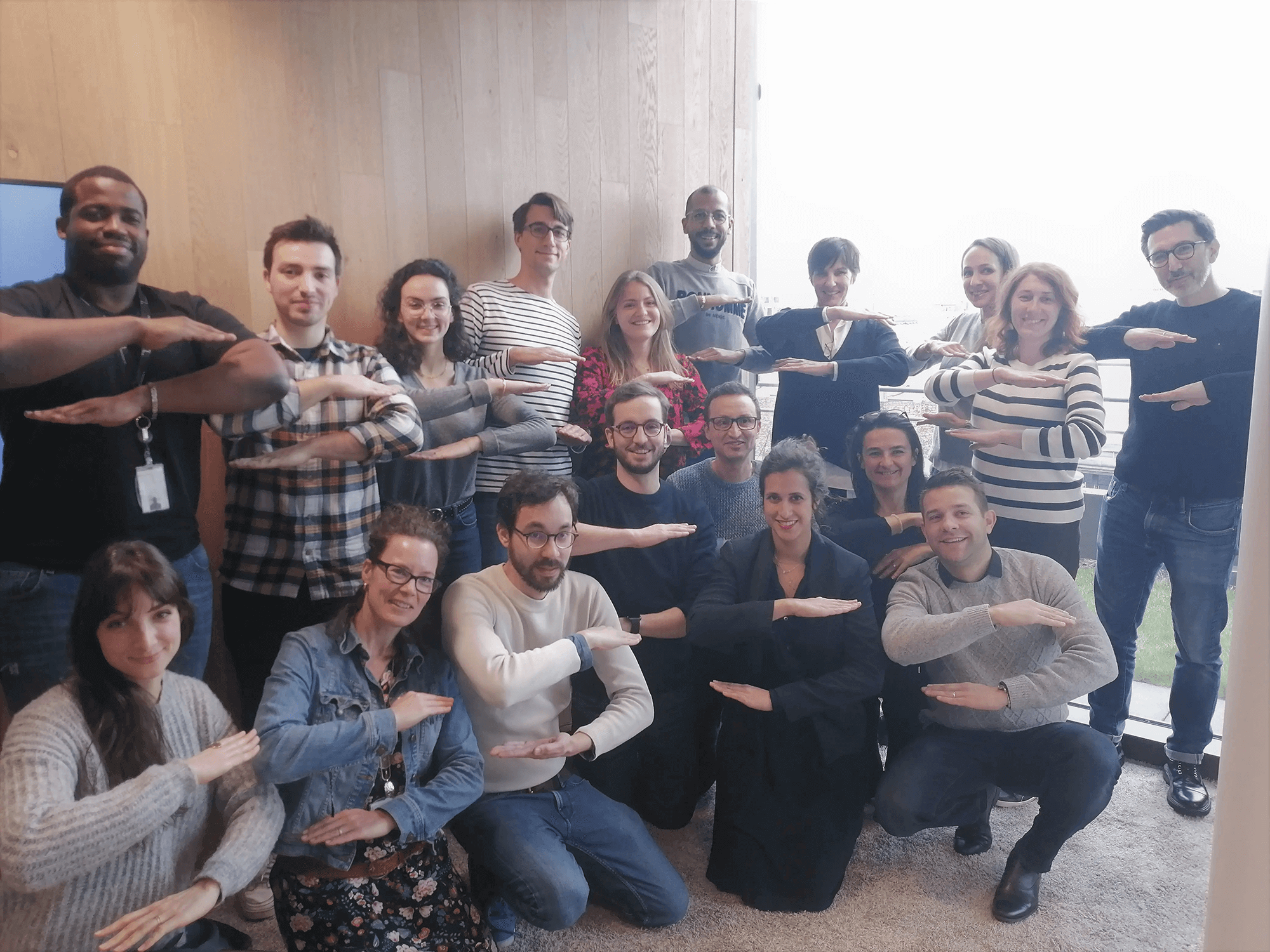 a group of people posing for a photo