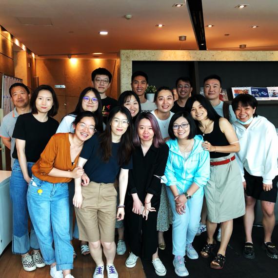 a group of people posing for a photo