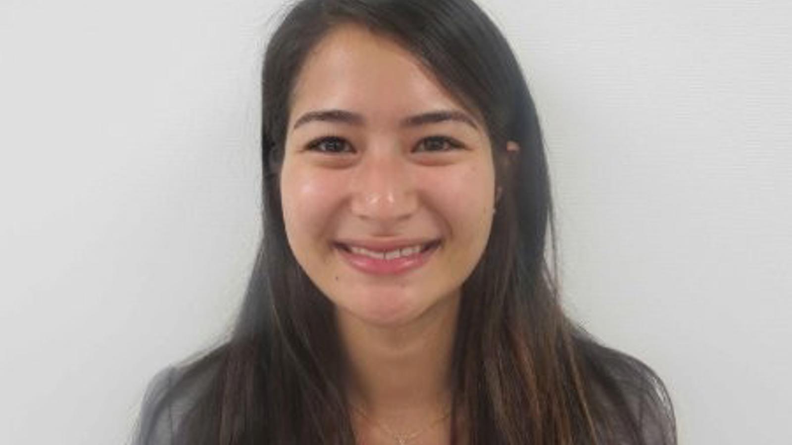 a woman smiling at the camera