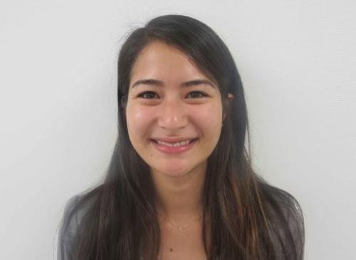 a woman smiling at the camera