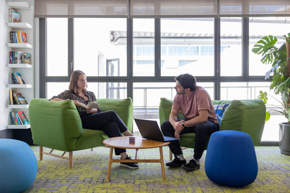 a man and woman sitting in chairs