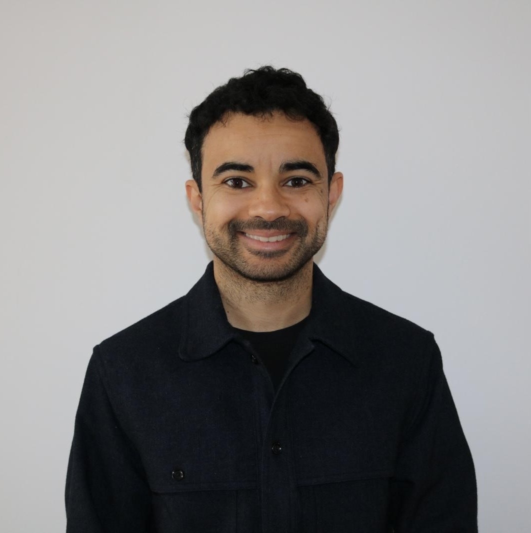 a man smiling for a picture