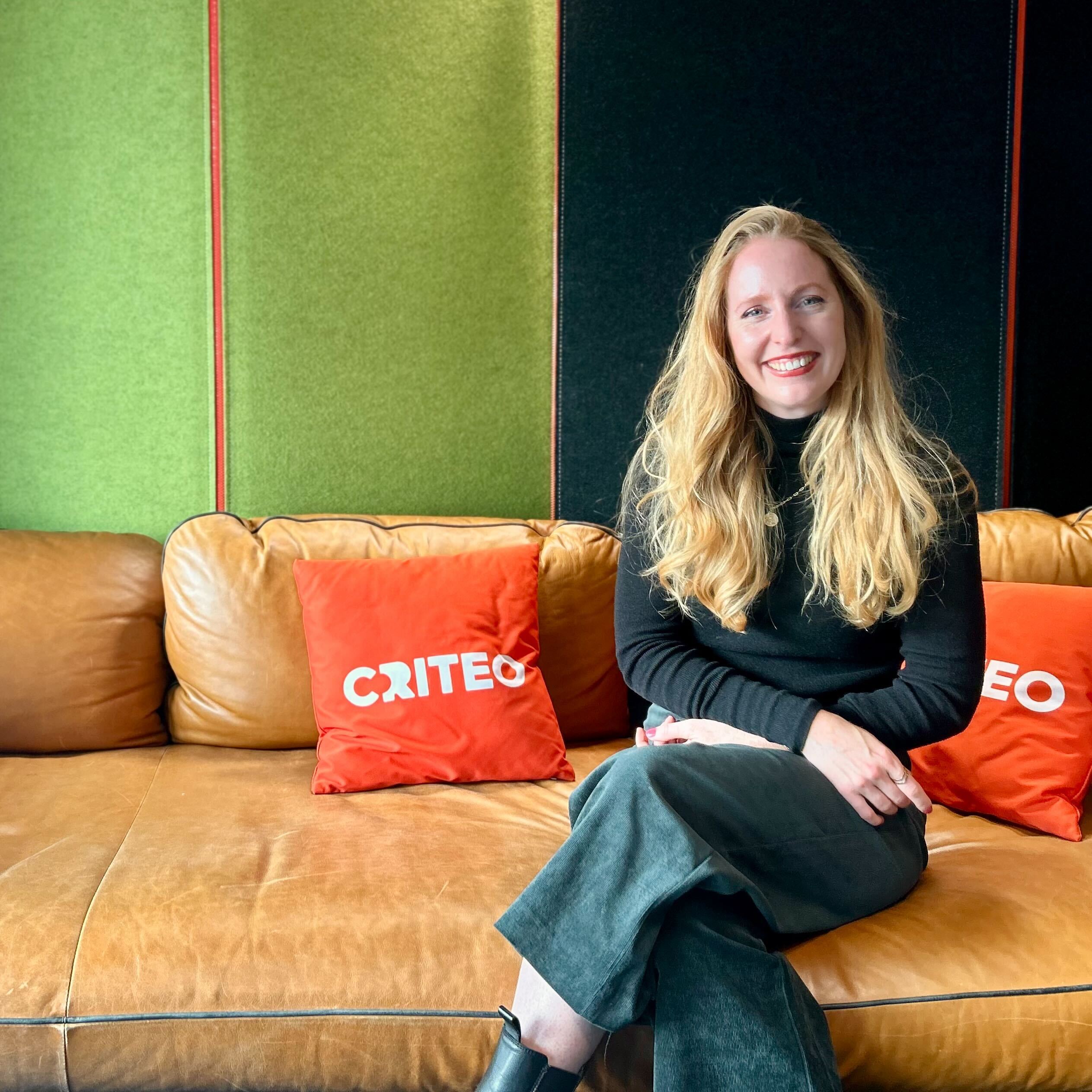 a woman sitting on a couch