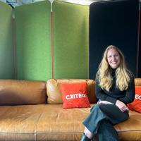 a woman sitting on a couch