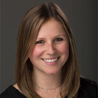 a woman smiling at the camera