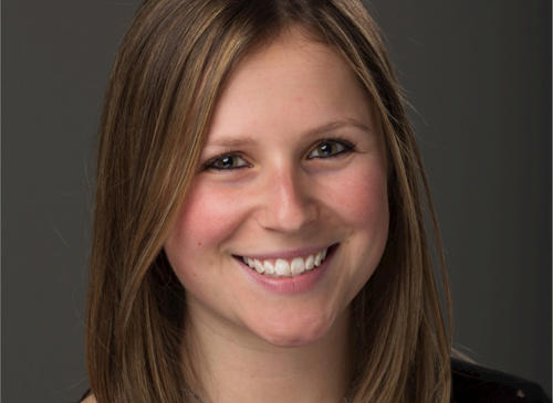 a woman smiling at the camera
