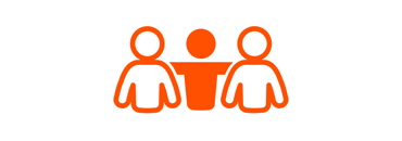 a group of people with one person standing